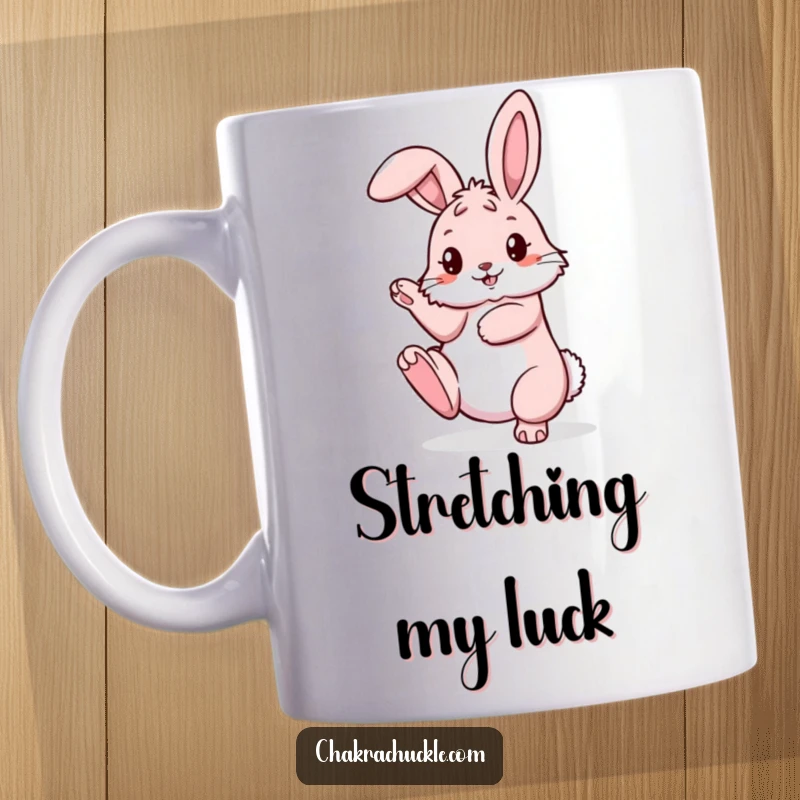 Funny pink bunny mug in a pretzel yoga pose with one leg extended high, showcasing adorable flexibility.