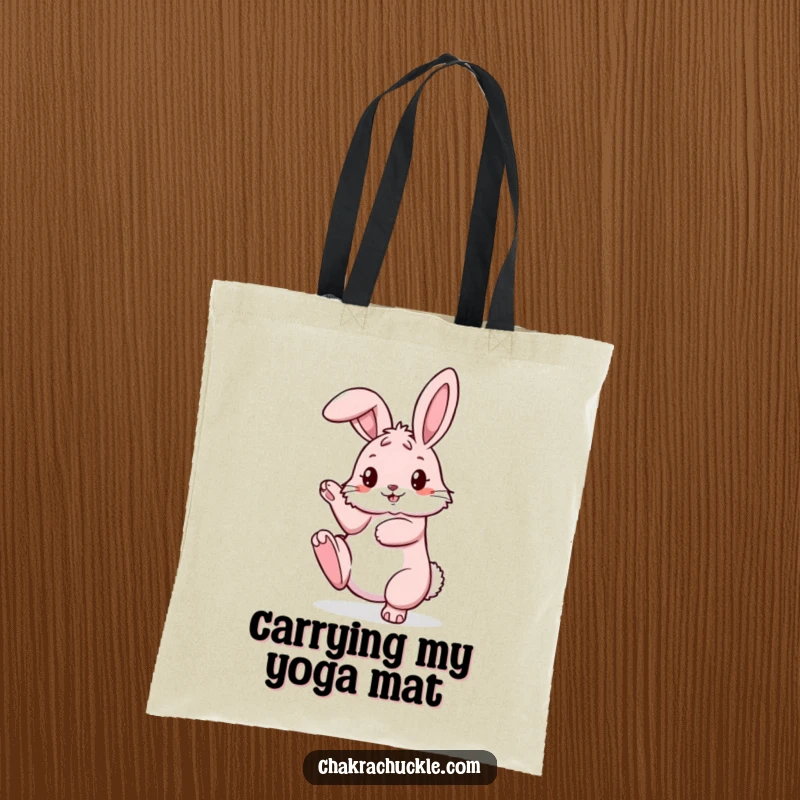 Funny pink bunny yoga tote bag, pretzel pose active, one leg up, perfect for carrying yoga essentials.